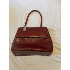 Rina Rich burgundy handbag with silver hardware